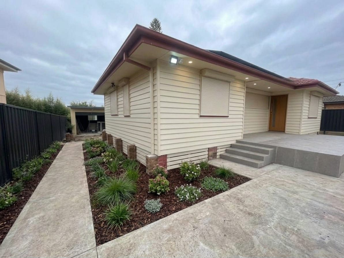 House after new cladding, porch and garden