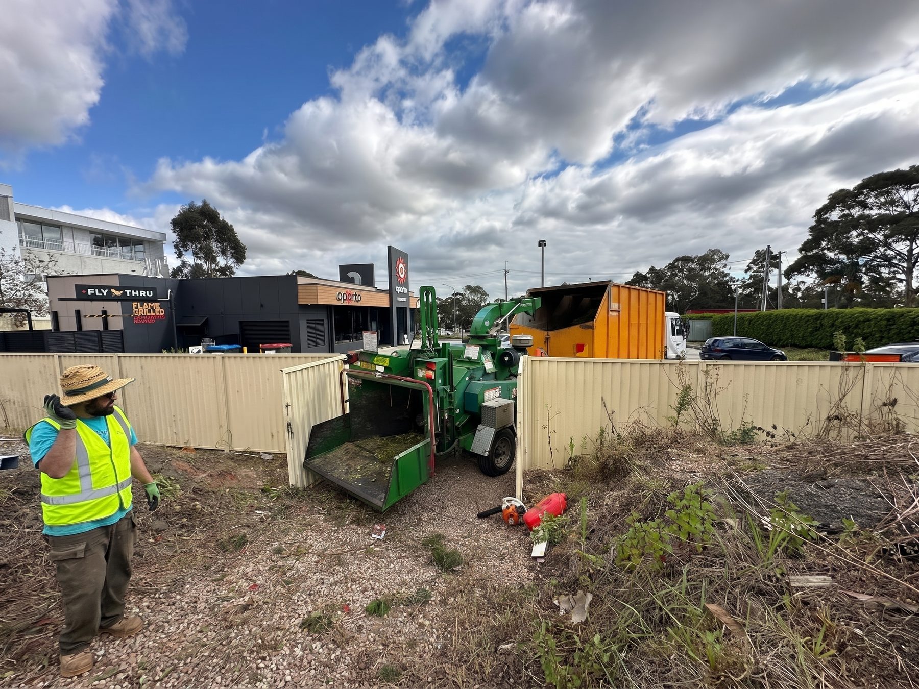 Electric mower on a suburban lawn